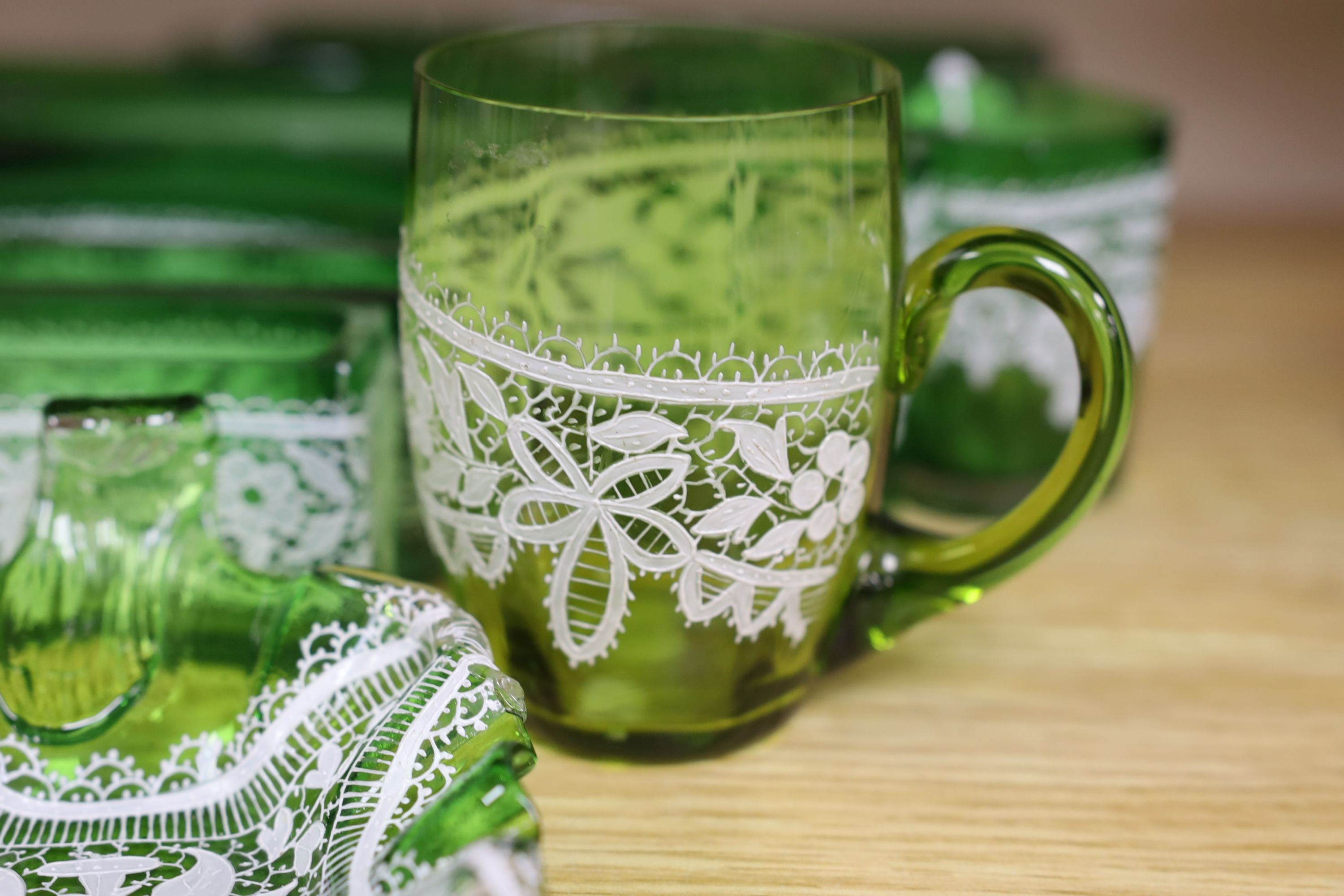 A group of Venetian green enamelled glass lace pattern posy tableware (12)